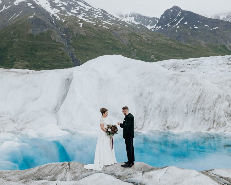 helicopter glacier elopement in alaska wedding photographer blue pools