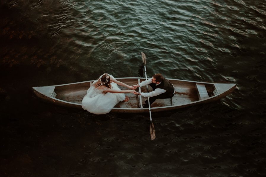 Couple kissing after handfasting ceremony