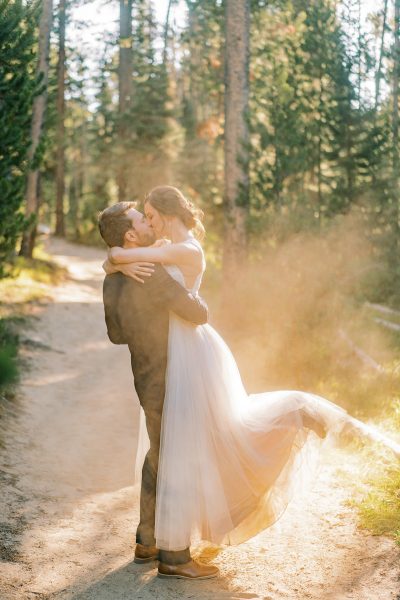 Getting a dress dirty at an elopement in the Grand Tetons.
