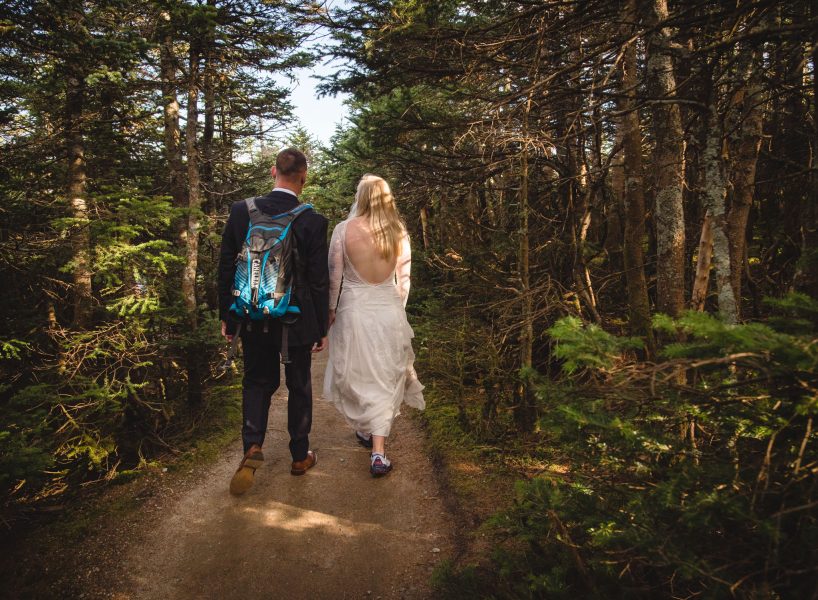 couple hiking for their New Hampshire Elopement