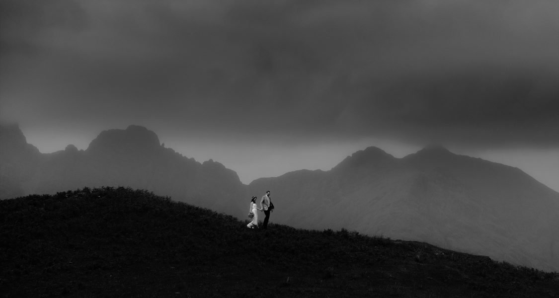 isle of Skye elopement couple walking the mountains