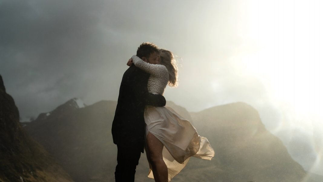 scotland elopement couple in the sunshine and rain during their wedding in Glencoe