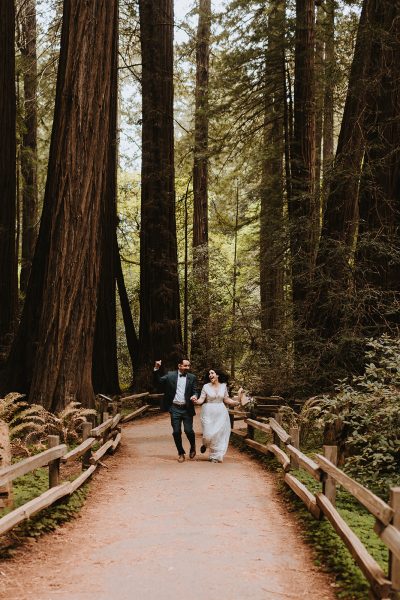 Couple Running Through the Redwoods