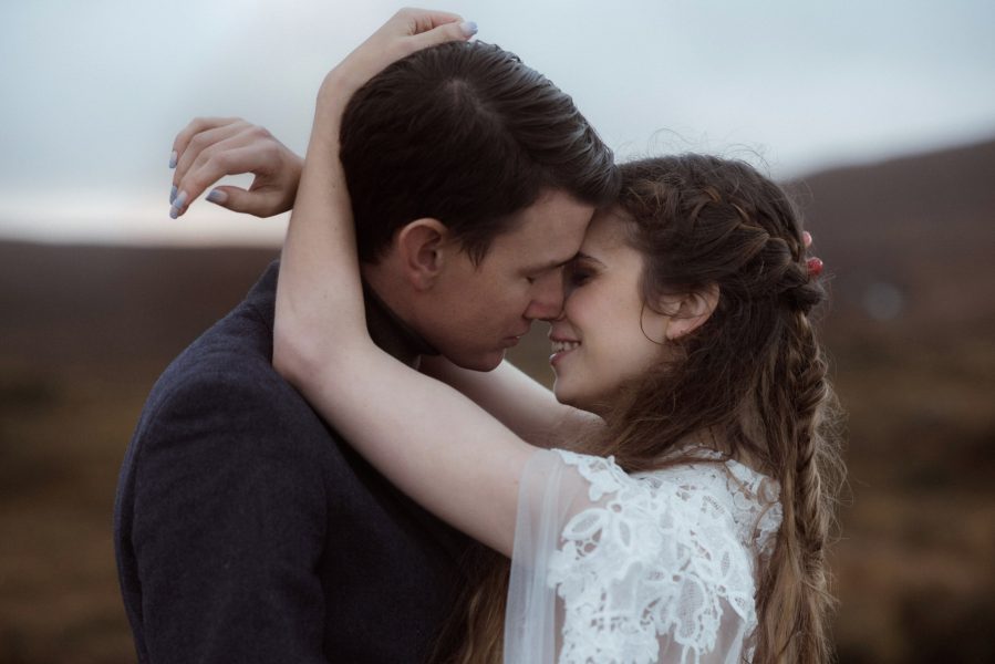 Bride and groom intimately embrace during an Isle of Skye elopement wedding