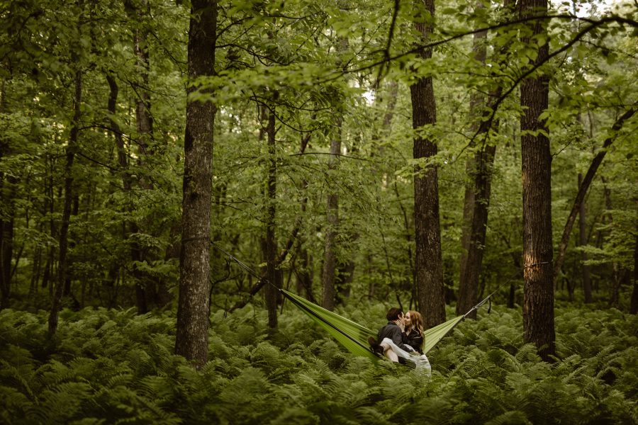 Couple hangin in a hammock on their wedding day