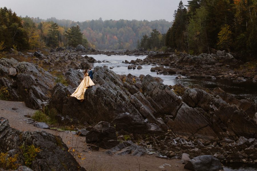 An eloping couple in the rocky terrain of Minnesota.