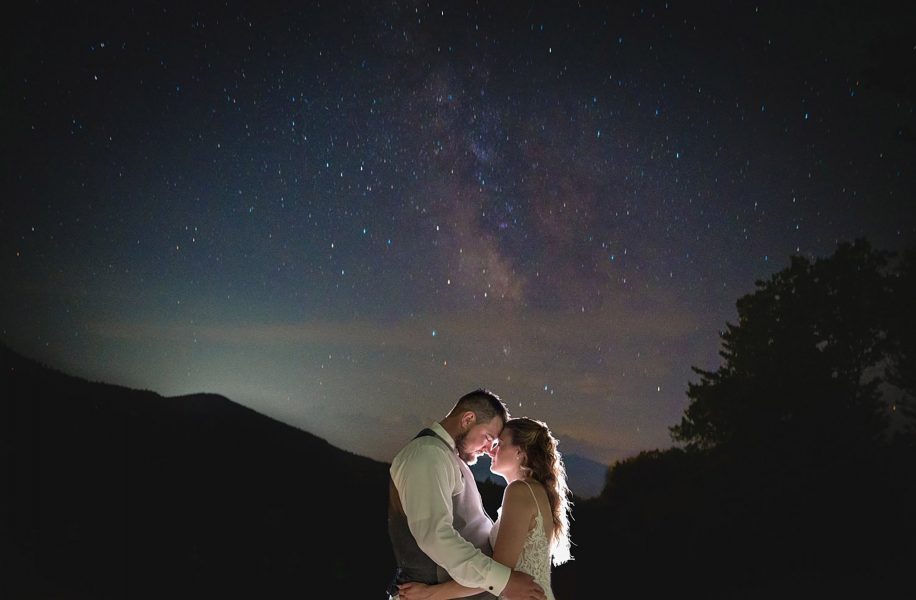 elopement couple under the stars in the mountains