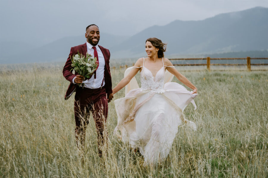 couple running in field