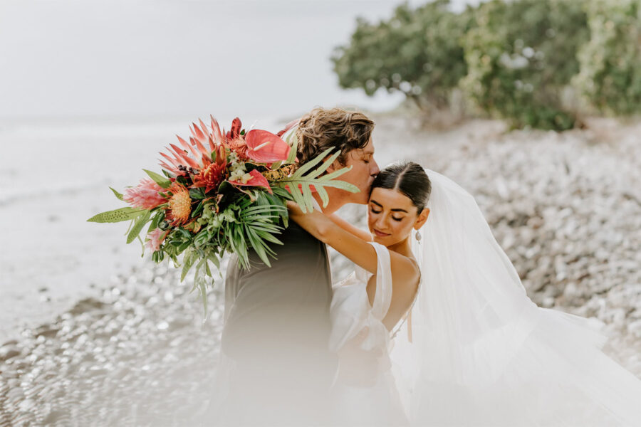 maui bride and groom embracing