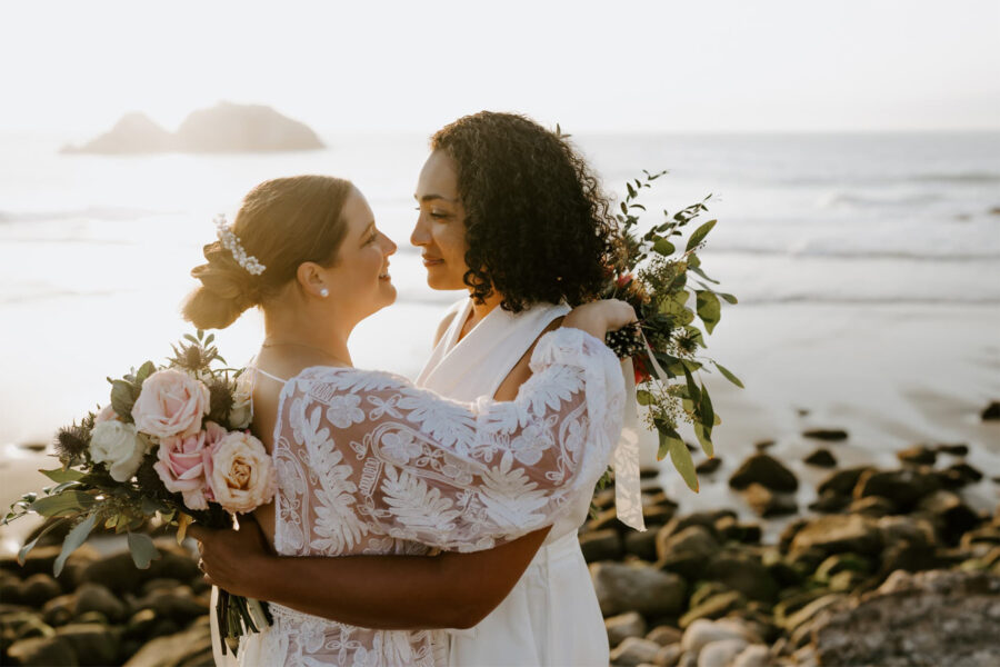 lgbtq couple embracing at lands end
