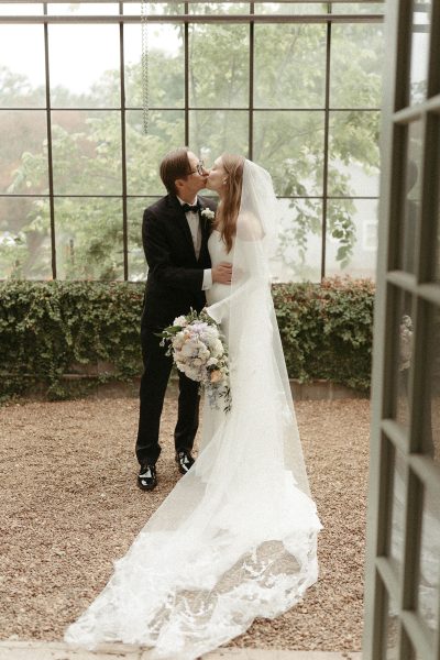 Bride and groom in a greenhouse in Charlotte, NC