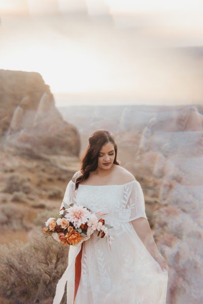 Bride standing with bouquet in Vantage