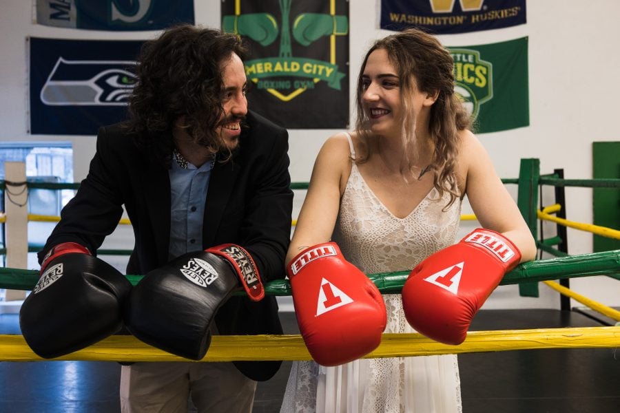Couple boxing during Seattle elopement at Emerald City Boxing
