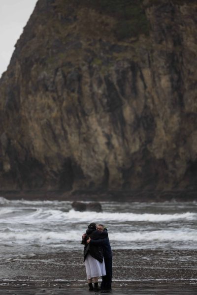 Couple hugging during Olympic National Park Second Beach Elopement