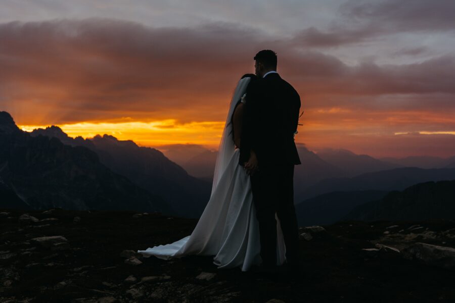 Couple eloping at sunrise in the dolomites