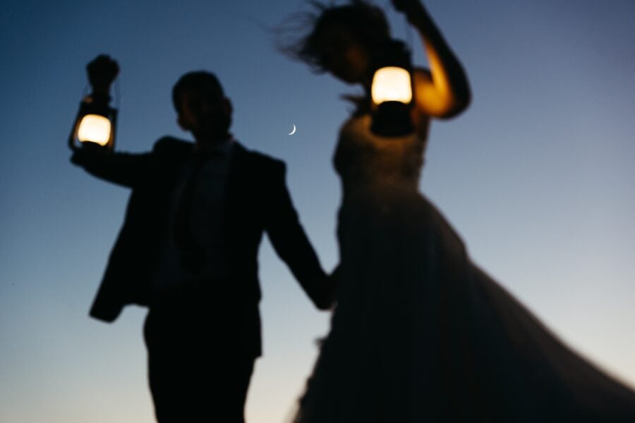 Couple eloping by lanterns at Cadini di Misurina and Tre Cime with the moon out