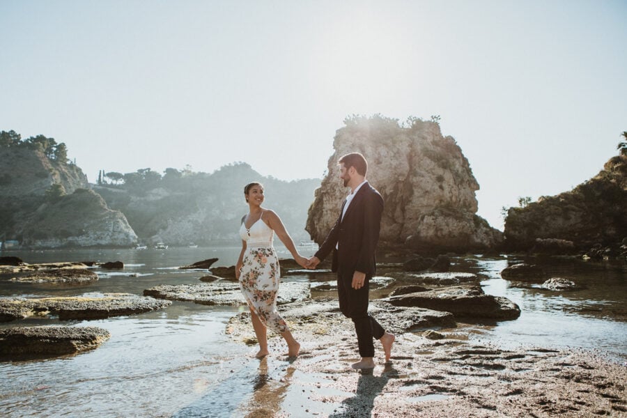 bride and groom on Isola bella during their elopement in taormina, sicily, italy