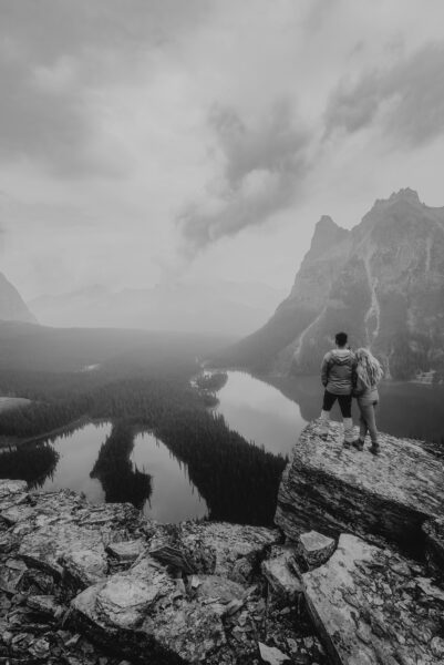 Couple overlooking mountains in Banff