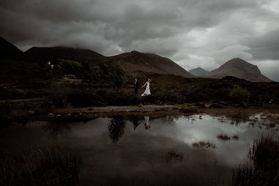 Eloping bride and groom with Skye landscape