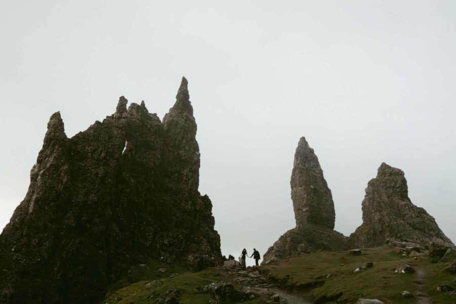 Tiny couple dancing in a big landscape at the old man of Storr