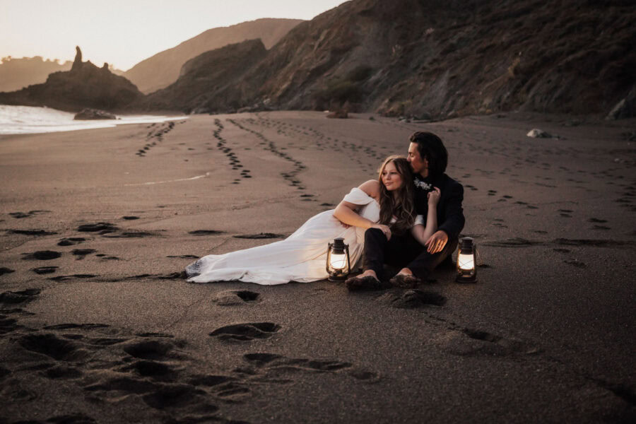 Joyful elopement couple walking hand-in-hand through the foggy streets of San Francisco