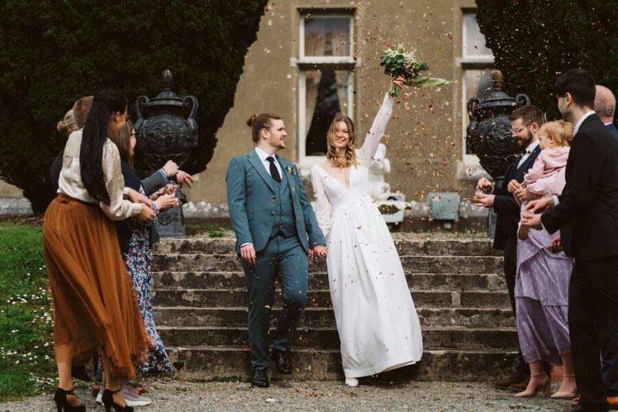 Couple celebrate after elopement ceremony in irish castle